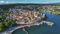Krk is a charming coastal town on the island of Krk in Croatia, known for its rich history and beautiful architecture.