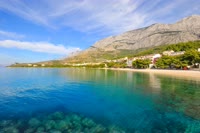 Tucepi is a charming coastal town located on the Makarska Riviera, known for its beautiful pebble beaches and crystal-clear turquoise waters.