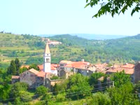 Momjan is a picturesque hilltop town in Croatia known for its stunning views of the surrounding countryside.