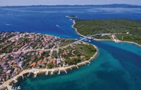 Zdrelac is a charming coastal town located on the island of Pasman, known for its crystal-clear waters and beautiful sandy beaches.
