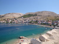 Metajna is a charming coastal town located on the island of Pag in Croatia, known for its crystal-clear turquoise waters and picturesque beaches.