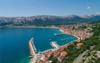 Draga Bascanska is a charming coastal town located on the island of Krk in Croatia, known for its crystal-clear waters and stunning natural beauty.