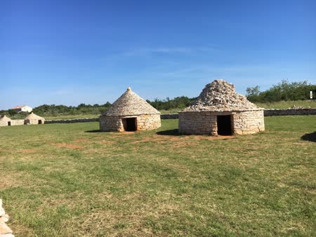 The Kazun Park in Vodnjan village is a charming outdoor space showcasing traditional stone huts called kazuns, offering a glimpse into the region's cultural heritage.