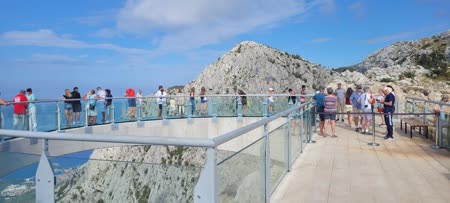 The Biokovo Skywalk, near Tucepi village, offers breathtaking views of the Biokovo mountain range and the Adriatic Sea from its glass platform suspended over the cliffs.