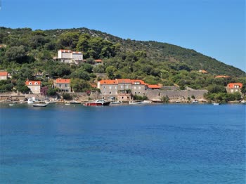 Elafiti Islands, near Mokosica village, are a group of picturesque islands in the Adriatic Sea, known for their stunning beaches, crystal-clear waters, and charming coastal villages.
