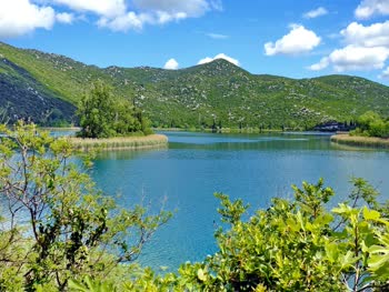 Bacina Lakes, near Ploce, is a picturesque natural wonder in Croatia, offering stunning views, crystal-clear water, and various recreational activities like kayaking and bird-watching.