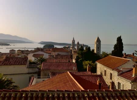 The Tower of St. Christopher in Rab village is a historical landmark, offering panoramic views of the Adriatic Sea and showcasing medieval architecture.